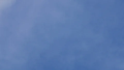 Zoom out white cloud withe blue sky background at day time, tele lens zoom ph Stock Footage 128942478