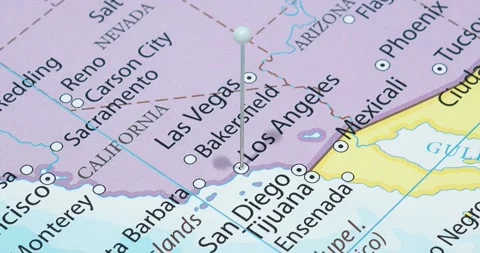 A zoom out of a white pin into Los Angeles city of The United States of America Video stock 323773571