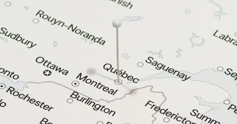 A zoom out of a white pin into a quebec city of Canada political map 스톡 동영상 323774519
