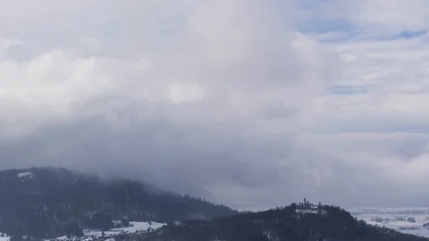 Zoom out winter landscape time lapse of village and agriculture fields Stock Footage 128775076