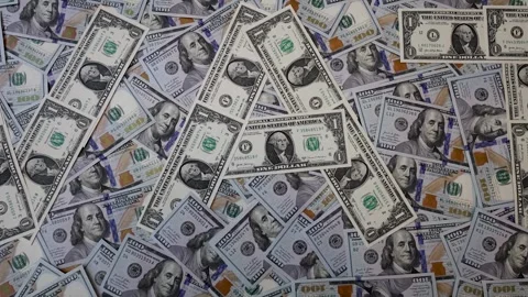 Zoom out from word VAT made of one dollar bills on hundred dollar banknotes Stock Footage 334662920
