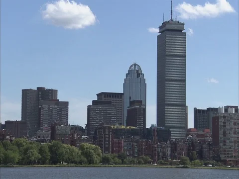 Zoom out WS of Back Bay skyline and Charles River Stock Footage 86750342