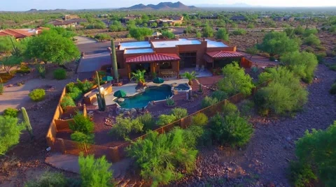 Zoom over the top Superstition mountain home AZ.mp4 Stock Footage 54258118