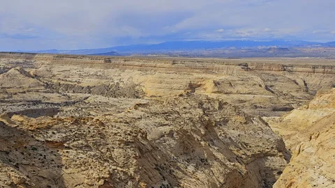 Zoom-Pan-Multilayer rock formation to plateau rim Stock Footage 242438737