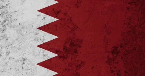 A zoom panning video of a worn out rusty wall with the bahrain flag Stock Footage 337427167