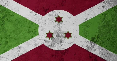 A zoom panning video of a worn out rusty wall with the burundi flag Stock Footage 337427815