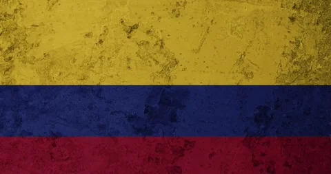 A zoom panning video of a worn out rusty wall with the colombia flag Stock Footage 337428065