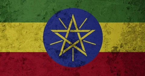 A zoom panning video of a worn out rusty wall with the ethiopia flag Video stock 337428335