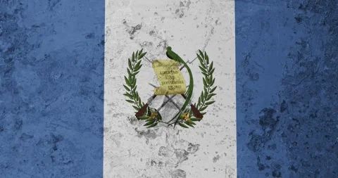 A zoom panning video of a worn out rusty wall with the guatemala flag Video stock 337428779