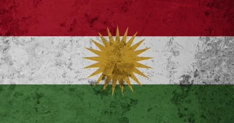 A zoom panning video of a worn out rusty wall with the kurdistan flag Видео 337429363