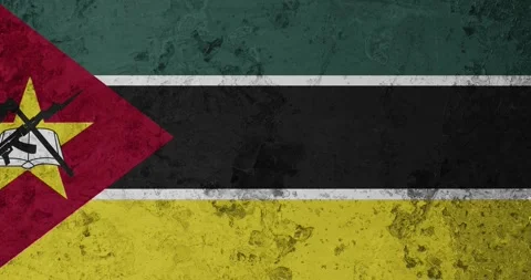 A zoom panning video of a worn out rusty wall with the mozambique flag Video stock 337429837