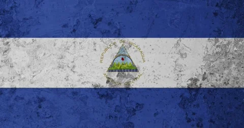 A zoom panning video of a worn out rusty wall with the nicaragua flag Vídeo Stock 337429940