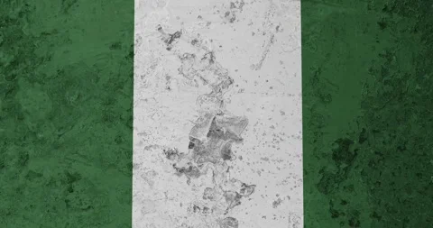 A zoom panning video of a worn out rusty wall with the nigeria flag Stockbeeldmateriaal 337429959