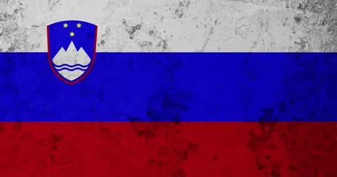 A zoom panning video of a worn out rusty wall with the slovenia flag Video stock 337431368