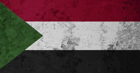 A zoom panning video of a worn out rusty wall with the sudan flag Video stock 337432243