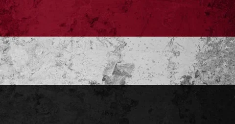 A zoom panning video of a worn out rusty wall with the yemen flag Stock Footage 337432811