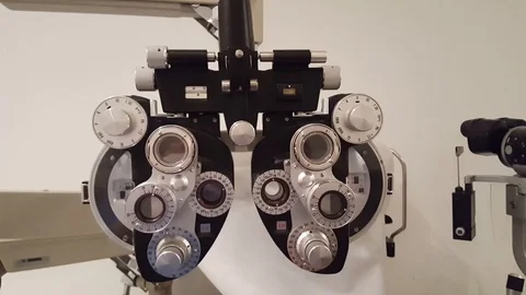 Zoom in-Phoropter ophthalmic testing device-eye examination equipment Stock Footage 97242797