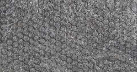Zoom, polyethylene bubble wrap for packaging. Top view. Stock Footage 148040564