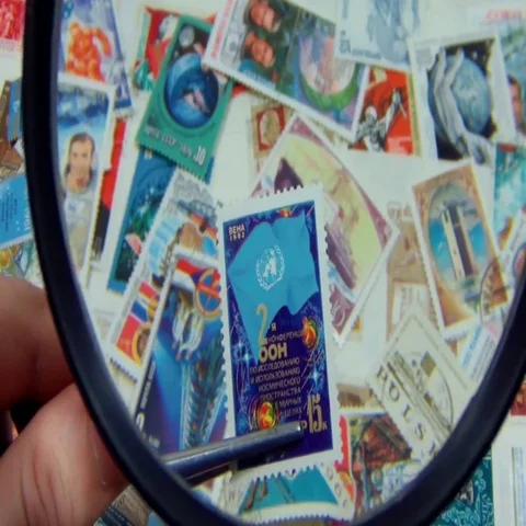 Zoom on a postage stamp of a rare collection Stock Footage 69557672