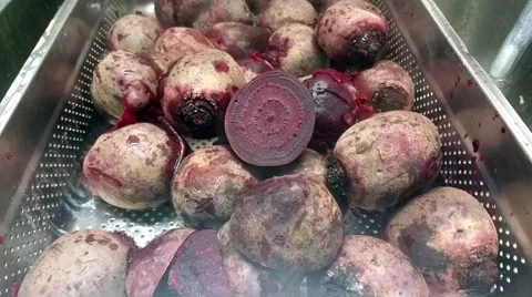 Zoom in on a purple beetroot half, at a restaurant kitchen Stock Footage 59618419
