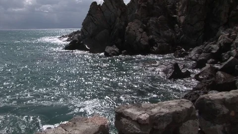 Zoom in to the sea with Cliff Stock Footage 76156025