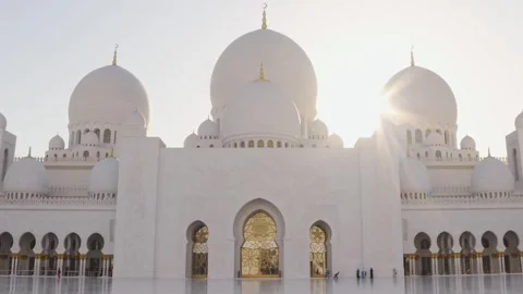 Zoom in Sheikh Zayed Mosque by Sunset. Sunflare soft lightning background. .. Stock Footage 308724595
