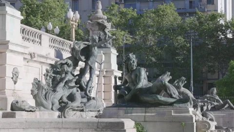 Zoom in shot of bronze statues at the base of the monument of the two congresses Stock Footage 278583760