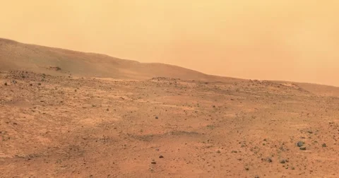 Zoom shot, with camera shake, of moderate dust storm at Tuskegee Crater, Mars. Stock-Footage 59146804