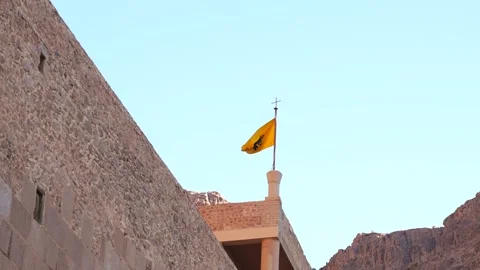 Zoom shot of the flag with the two-headed eagle of the Byzantine empire in Saint Stock Footage 254208288
