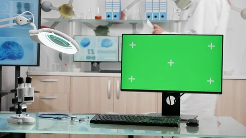 Zoom in shot on green screen computer in modern medical office Stock Footage 110899355