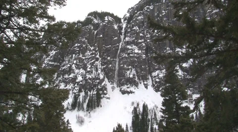 Zoom in shot of ice climber. Video stock 36776833