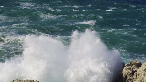 Zoom shot of large wave hitting coast Video stock 168777581