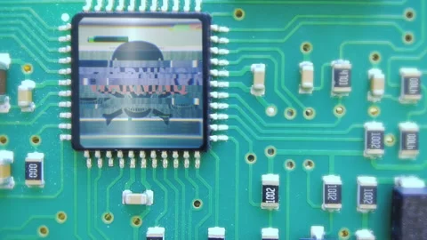 Zoom on skull virus glitch on microchip of motherboard in computer system. Stock Footage 172284083