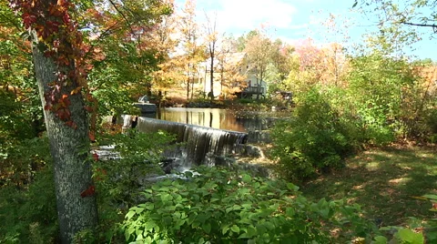 Zoom in to small water fall in New Hampshire Stock Footage 888670