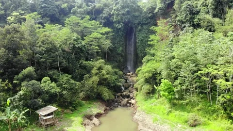 Zoom In Small Waterfall Beside the River. Ciranjang, Indonesia Video stock 246853273