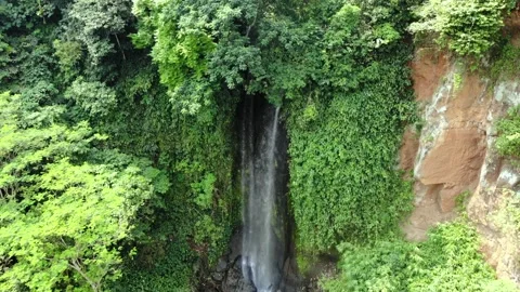 Zoom In Small Waterfall Beside the River. Ciranjang, Indonesia Video stock 246853690
