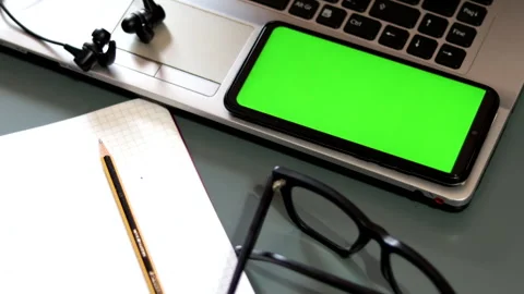Zoom on a smartphone with green screen. Stock Footage 253558477