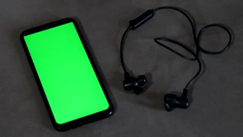 Zoom on a smartphone with green screen. Stock Footage 253558483