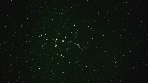 Zoom in on a star cluster in deep space that resembles a beehive Stock Footage 241103683
