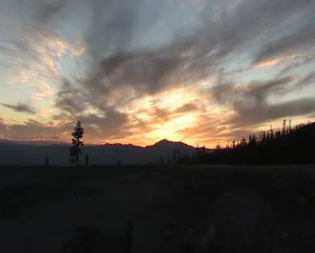 Zoom in sunset behind beautiful clouds Stockbeeldmateriaal 12688546