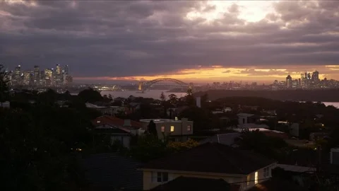 Zoom in Sunset time lapse over Vauvluse housing and Sydney city 4K Stock Footage 309836443
