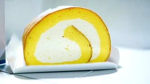 Zoom in on Swiss roll or cake roll Stock Footage 305775878
