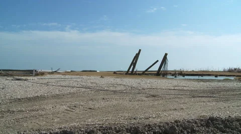 Zoom-in from tangled and broken power lines on ground to broken pipe spouting Vídeo Stock 59548312