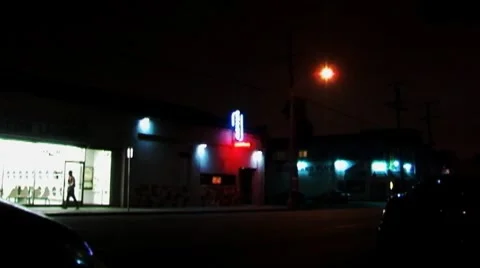 Zoom on Tavern Cocktails Neon Sign at Night 2b Stock Footage