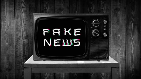 Zoom in then fixed shot on words FAKE NEWS, 3d rgb wavy font, bad reception Stock Footage 119437285