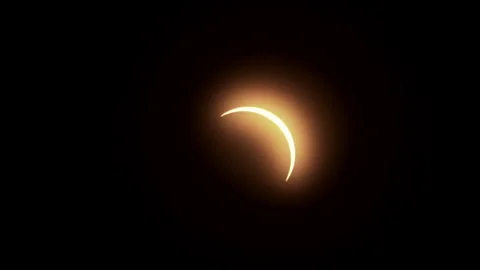 Zoom-in on thin crescent sun during partial phase of solar eclipse. Stock Footage 274039598