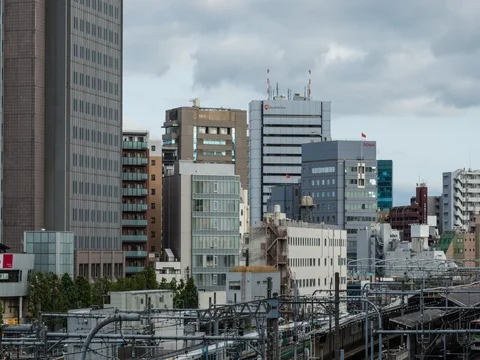 Zoom-in time-lapse footage of the cloudy sky over Shinjuku area, Tokyo, Japan Stock Footage 76387757