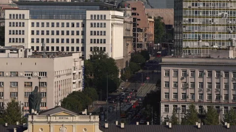 Zoom time lapse view of sunset over historic buildings and traffic on Belgrade Stock Footage 252372395