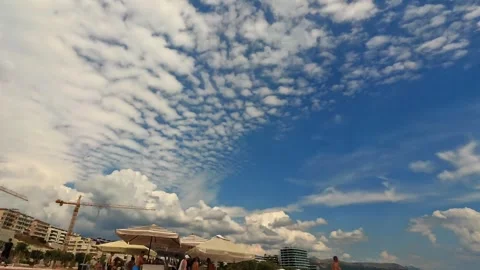 Zoom-in timelapse of clouds over a beach in Split Stock Footage 316751351