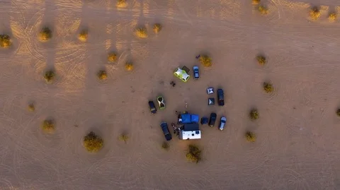 Zoom in top down view of camp in the desert Stock Footage 99158373